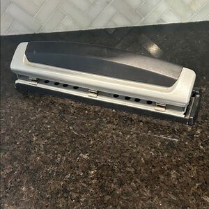 Swingline Precision Pro Top 3 Hole Puncher silver, and black